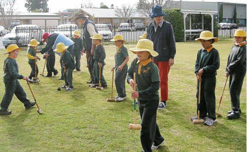 Dalveen State School students get some tips at the Warwick Croquet club. Dalveen State School students get some tips at the Warwick Croquet club.